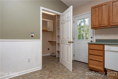 Laundry Room is off the kitchen.  Back door leads 