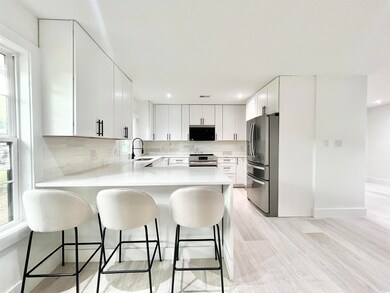 Kitchen featuring a healthy amount of sunlight, st