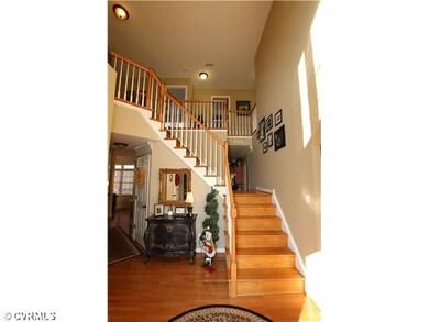 Foyer - Two Story Foyer with wood floors and doubl
