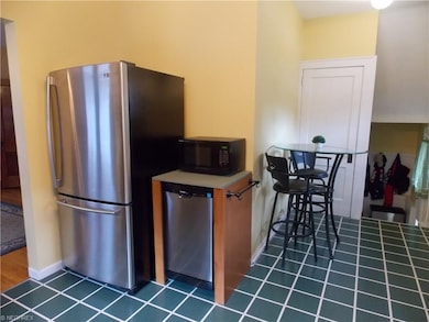 Cozy eat in area for casual dining. Appliance are 