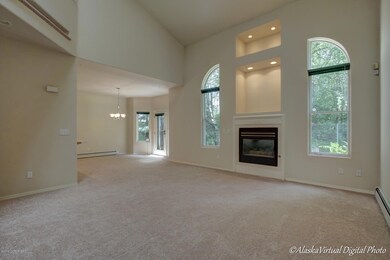 Living room w/cathedral ceilings