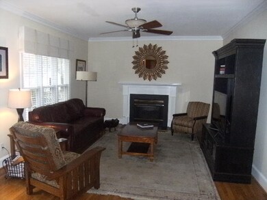 SPACIOUS family room with wood floors, gas firepla