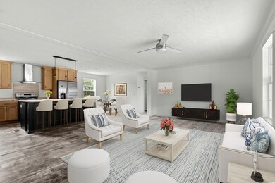 Living room with ceiling fan, light wood-style flo