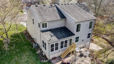 Back view of the home. Walk out patio on lower level.