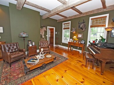 Living Room Has Hand Hewn Reclaimed Wide Plank Flo