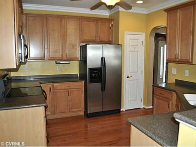 Kitchen - Another view - showing the pantry and an