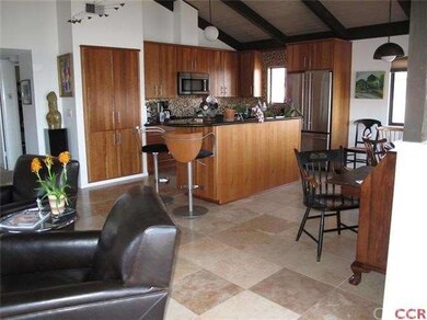 Gorgeous tile floors, open floor plan, vaulted cei