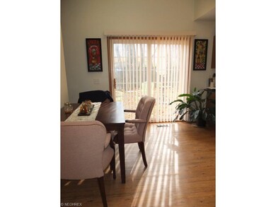 Dinette with slider to backyard.