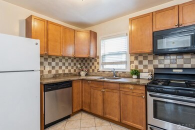 Plenty of cabinets in this spacious kitchen!