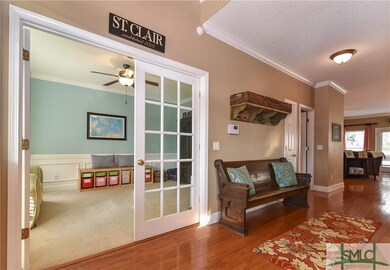 Gorgeous french doors on both sides of the hallway