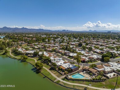 community pool with lake
