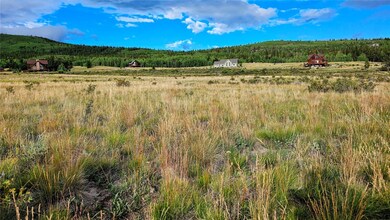 Property view of mountains with a rural view