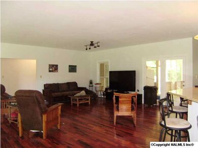 The Living Area with Beautiful Brazilian Tigerwood/Koa Hardwoods and fresh paint