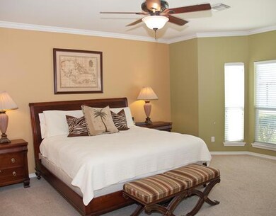 This Master Bedroom is attractive and spacious. It