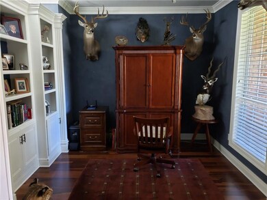Study With Custom Built In Shelves & Cabinets Wood