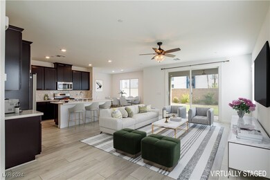 Open concept family room, kitchen and dining nook.