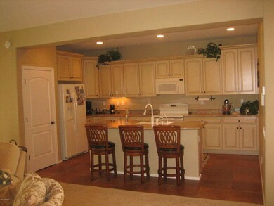 Kitchen with island and seating