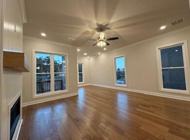 The kitchen opens up to the gorgeous large living 