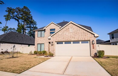 This charming two-story brick home features a mode