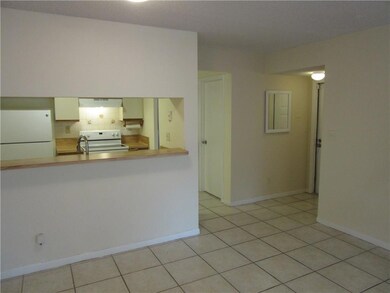 First floor corner unit all tiled