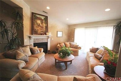 Formal living room at foyer has door leading to ba