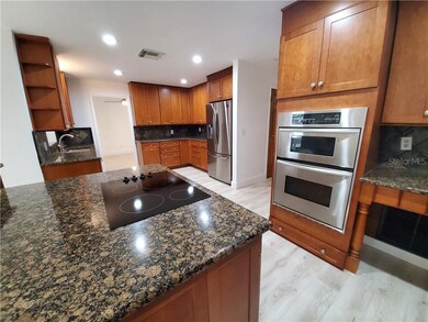 Large Island with Cooktop and Wine / Beverage Cool