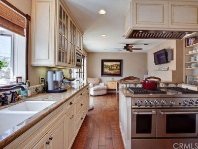 Kitchen with easy access to Family Room, patio and