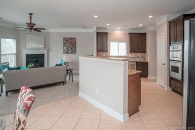 Open Floor plan. View of Kitchen and Family Room.