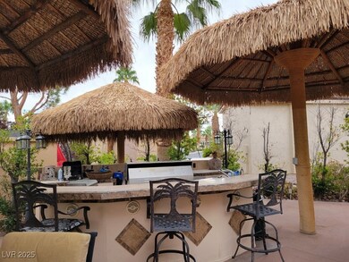 View of patio with a gazebo, an outdoor kitchen, a