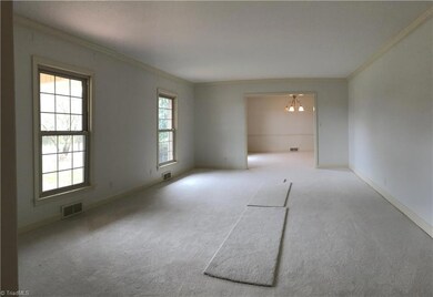 Large carpeted living area.