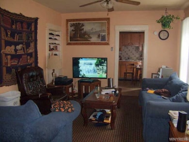 Living Room. UPPER FRONT APT.