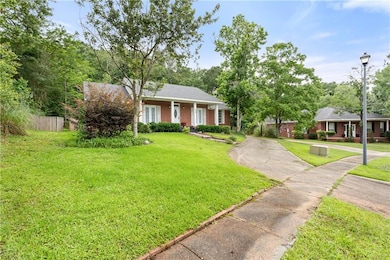 Ranch-style house with driveway