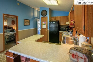 The Kitchen.  The Master Bedroom is through the do