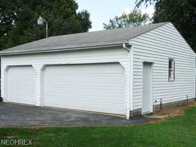 Separate 3 car garage with 220 line. 670 sqft.