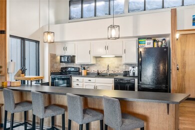 Double-sided island with ample seating for guests.