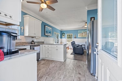 Kitchen with appliances with stainless steel finis