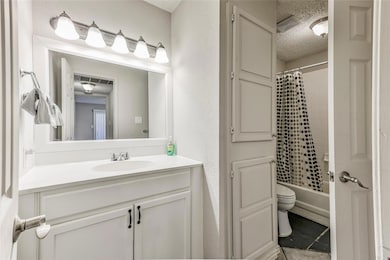 Full bathroom featuring vanity, shower / bath comb
