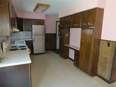 Kitchen looking toward garage entry