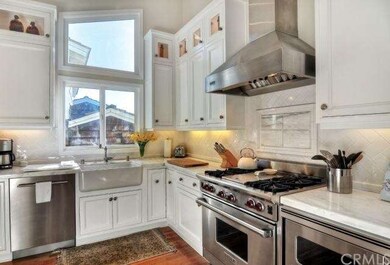 Top of the line appliances include a Wolf stove an