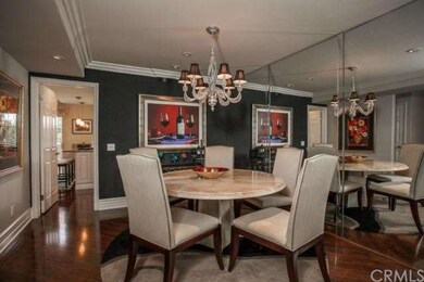 Dramatic dining room with ambient lighting.