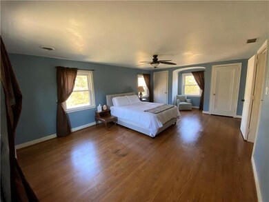 Master bedroom with his and hers closets.