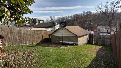 One Car Garage in Fenced In Yard, Notice the doubl