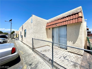 View of side of property with stucco siding and a
