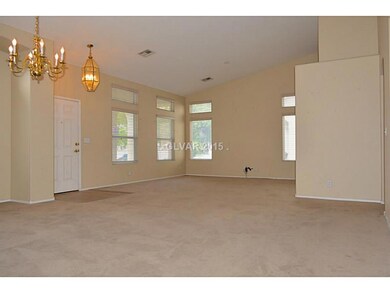 Living Room. View of front door & formal dining ar