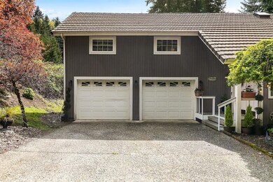 The smaller of the two garages, located by the main entrance and below the studio ADU 