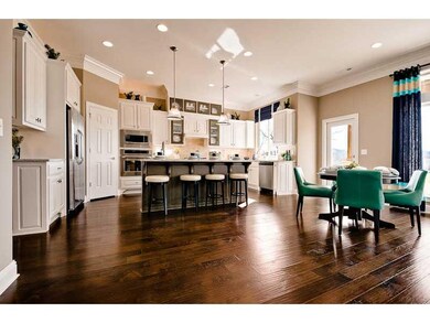 Kitchen. Home is under construction. Photos are for floor plan/design reference. Actual colors & options vary
