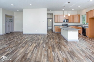 Kitchen open to living/dining areas