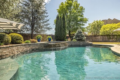 Stunning stonework and water feature joining the s