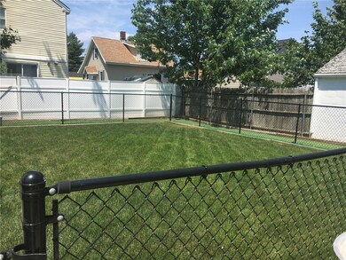 This shows the fenced in yard with a separate encl