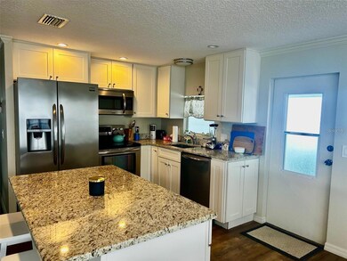 5742 Camelot Dr N, Sarasota, FL 34233 - photo 2